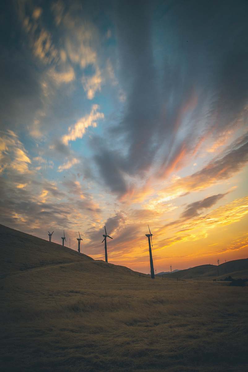 tracy several windmills under cloudy sky desert